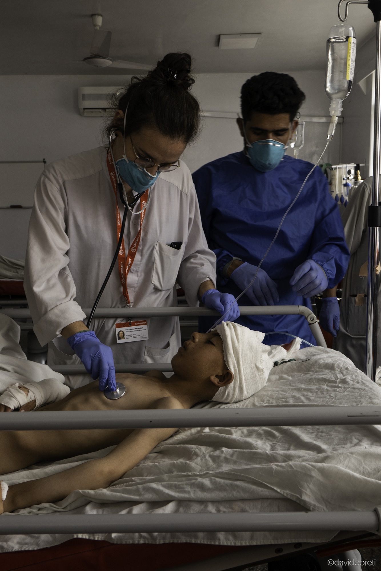 Kabul, Afghanistan — July 19, 2021.

WAAHID - 11 yo

'He's my only son. I would like to have another child but I can't, I'm too old,' Muhammad tells me crying. His 11-year-old son Waahid is inside the operating theater. Muhammad, 65 yo, is sitting in front of the OPD (Out Patients Department) of the EMERGENCY Surgical Centre for War Victims in Kabul.

That same morning his wife called him 'They shot Waahid! They shot Waahid!' she yelled. Waahid is their only son. Like every morning he was taking the sheep to pasture, close to home. Together with his two sisters and his parents he lives in the Zanakhan district, one of the poorest and least populated in the Ghazni province.

