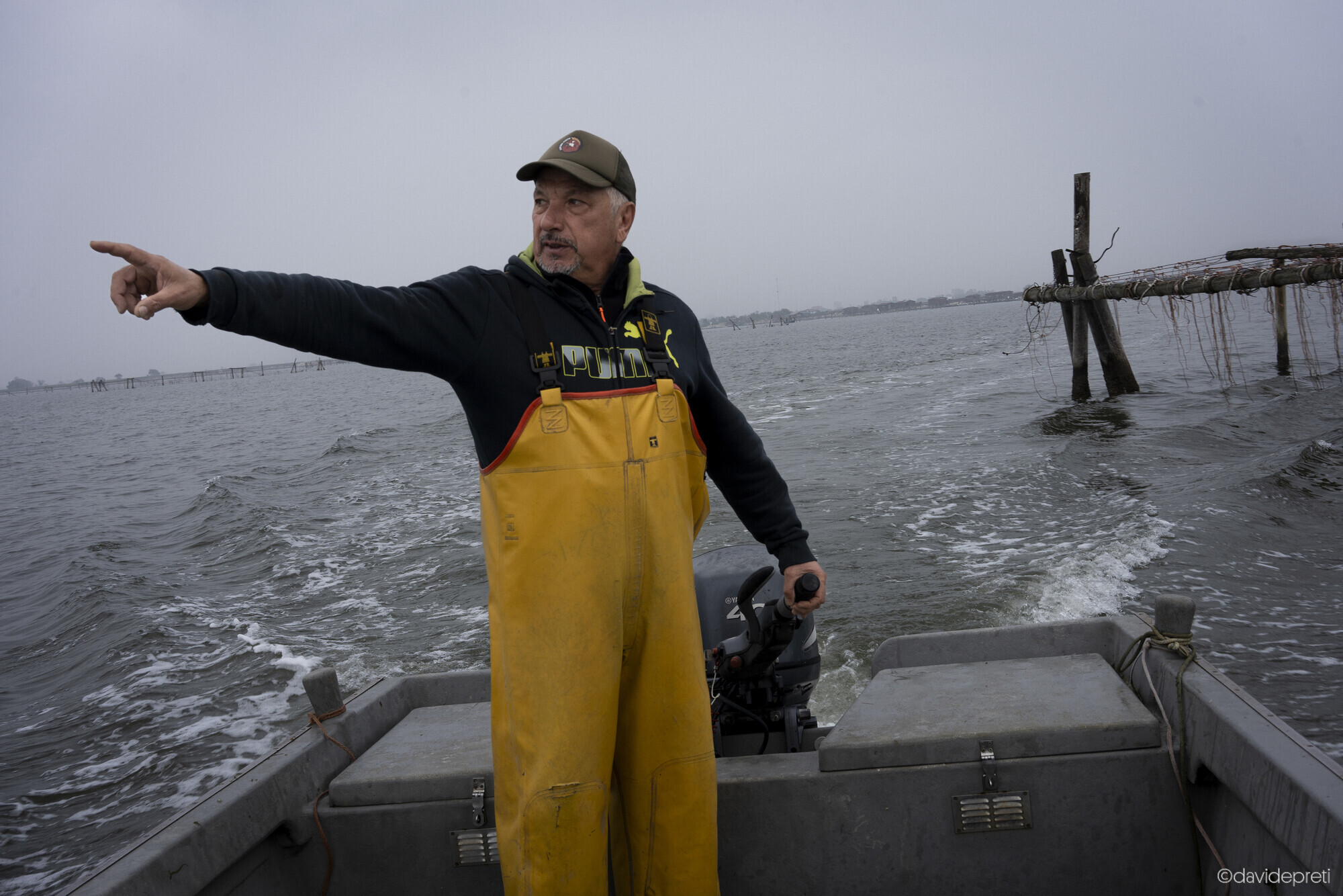 Scardovari Lagoon, Italy — November 8, 2024.

Massimo pointing to the crab traps (nasse) he sets to capture the invasive blue crabs overrunning the Po Delta.
