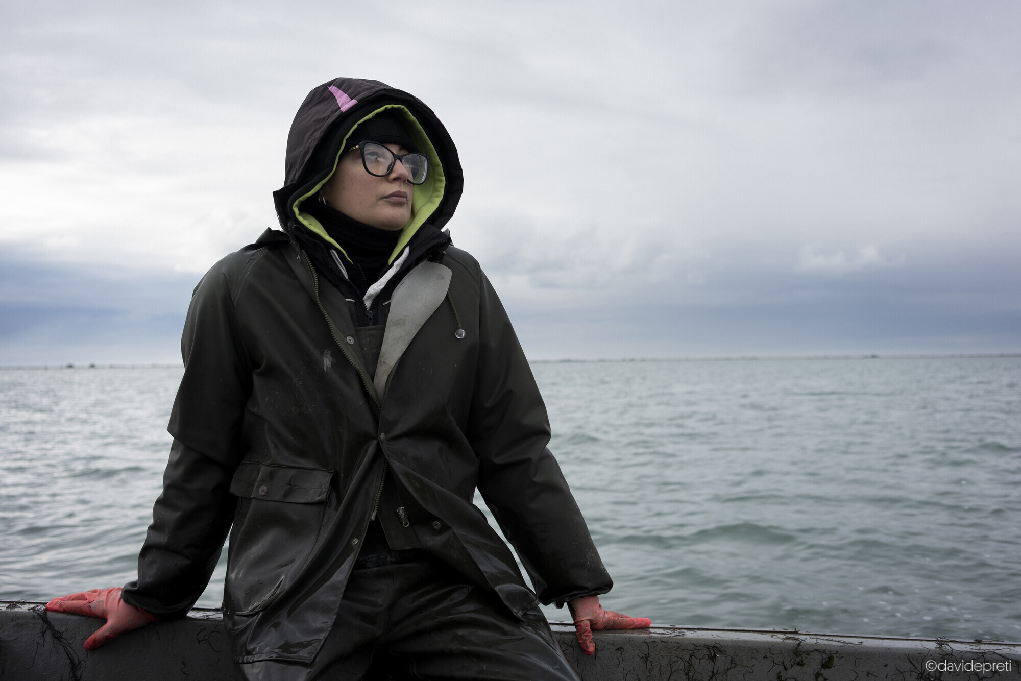 Scardovari Lagoon, Italy — December 4, 2024.

Meri setting out to harvest crabs. She only comes out on the water occasionally now, working mostly as a hairdresser since the local clam industry collapsed.
