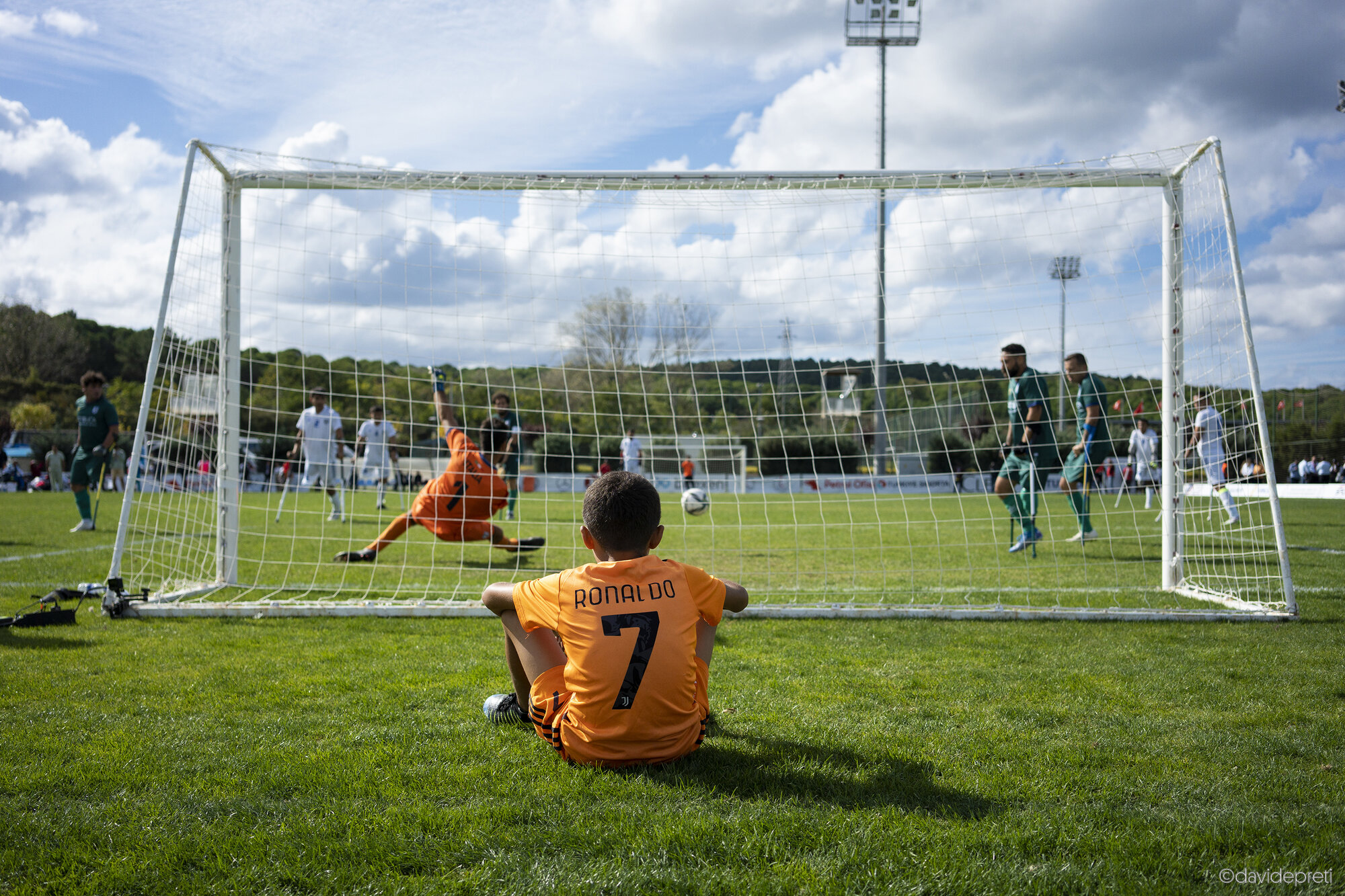 Istanbul, Turkey — October 6, 2022.

A young fan watching the Italian national amputee football team in action at the Amputee Football World Cup.

