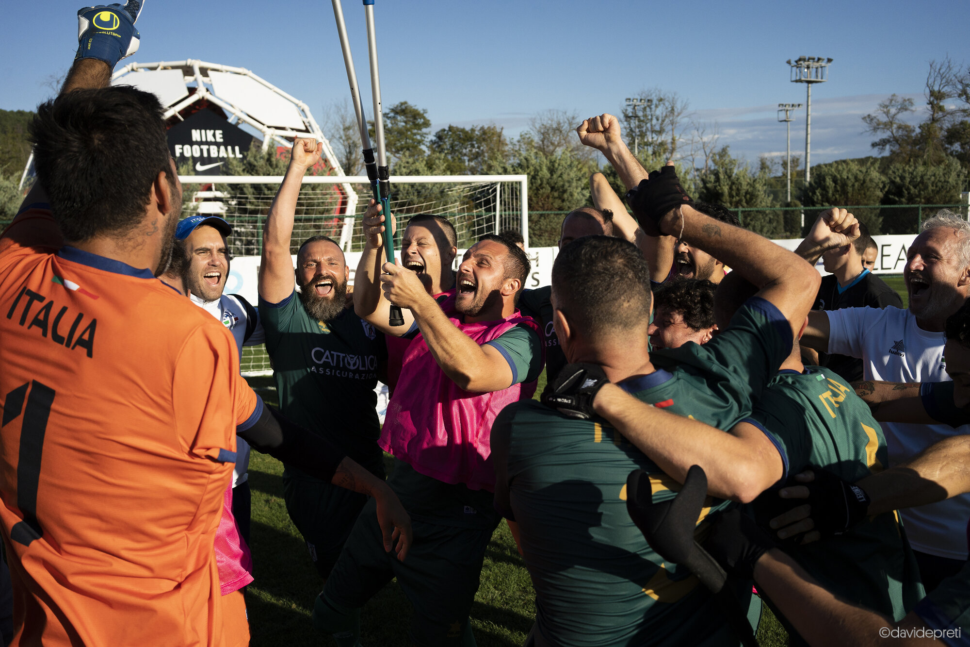 Istanbul, Turkey — October 2, 2022.

Italian amputee football players celebrating following their decisive win to reach the knockout stage at the Amputee Football World Cup.

