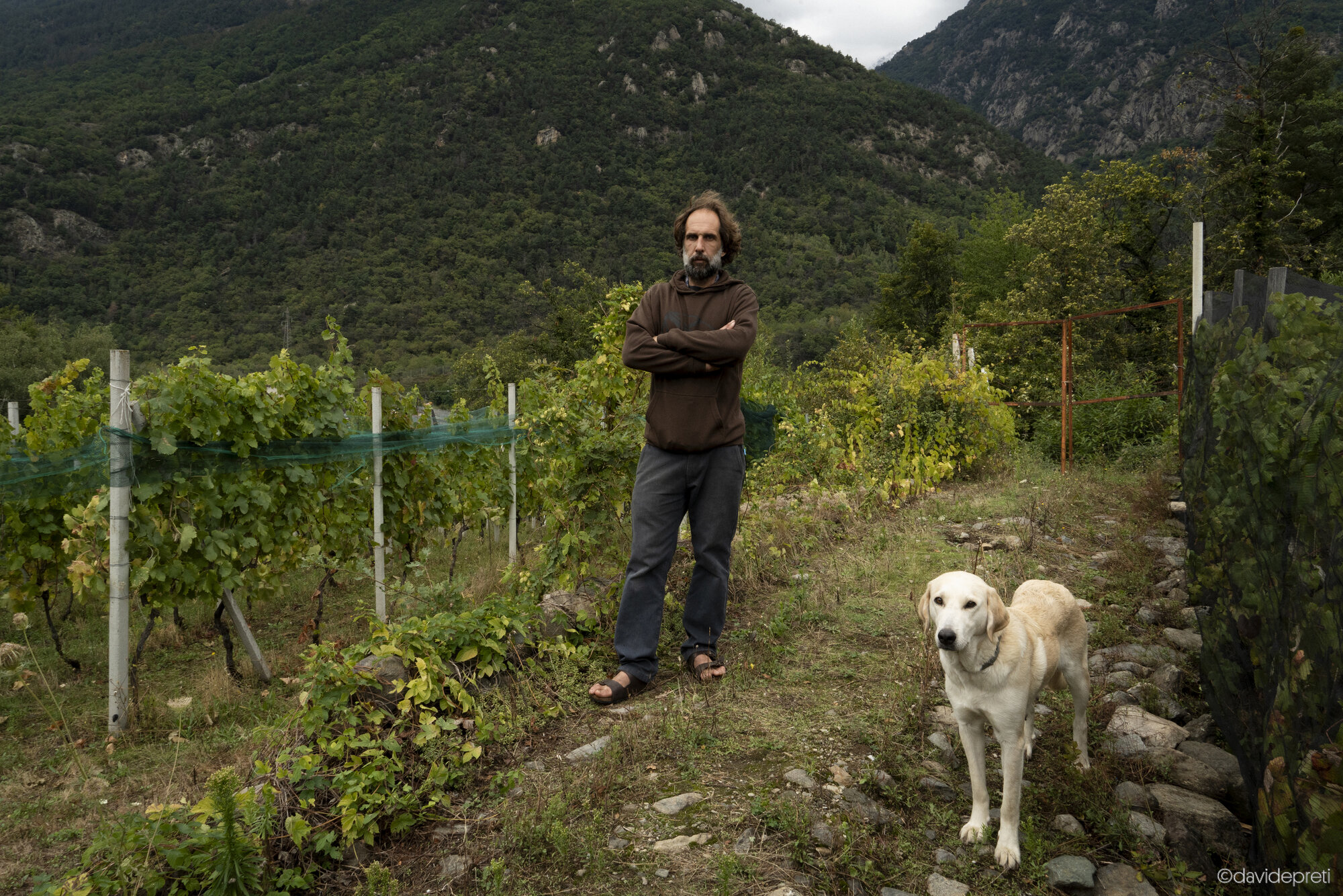 Chiomonte, Italy — September 19, 2024.

LUCA - 42 yo

Local winemaker tending to the vineyard he manages within the perimeter of the Lyon-Turin high-speed rail line (TAV) construction site in the Susa Valley.
