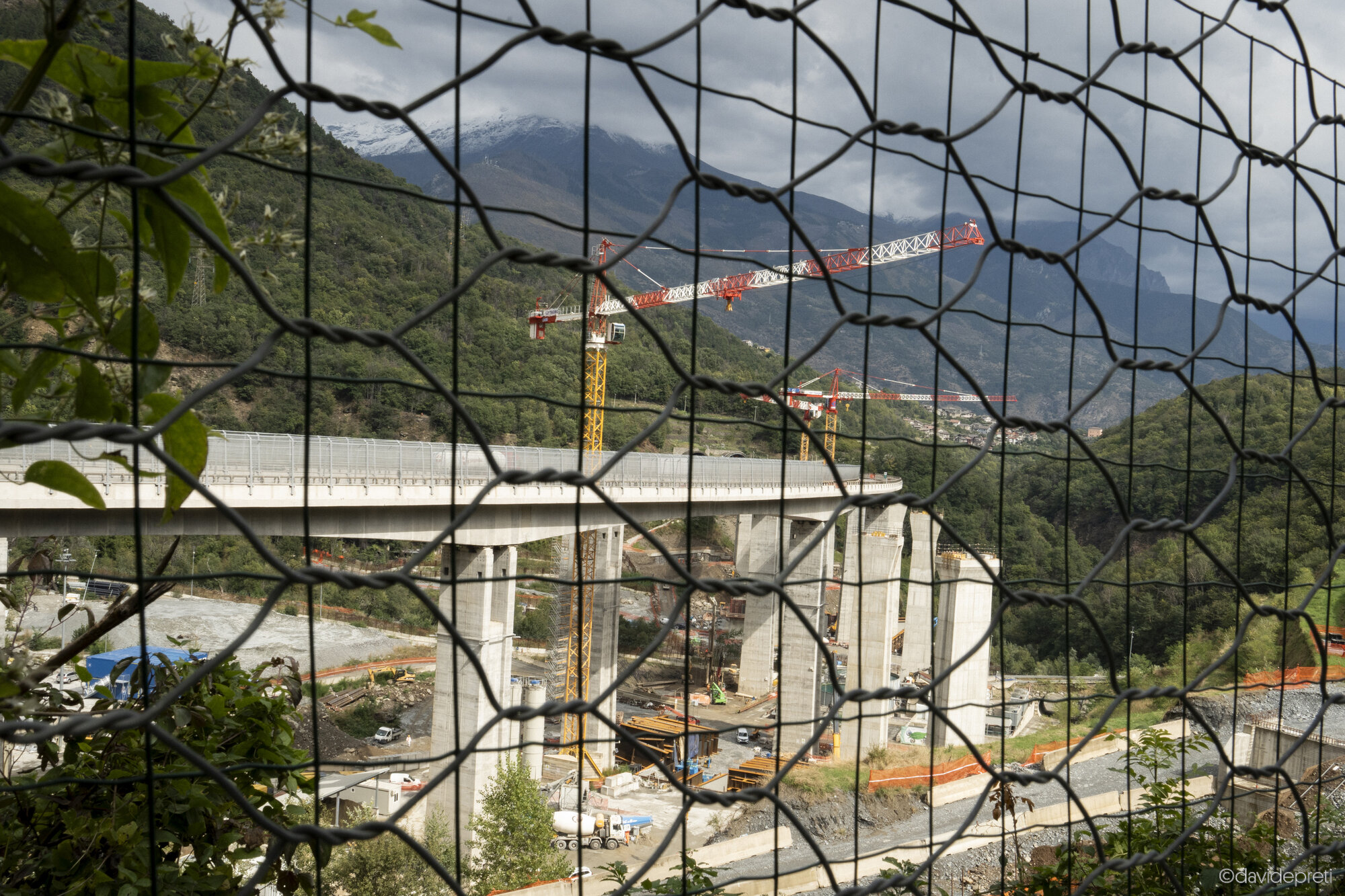 Val di Susa, Italy — September 19, 2024.

A view showing the construction site of the Lyon-Turin high-speed rail line (TAV) behind high-security barriers in the Susa Valley.
