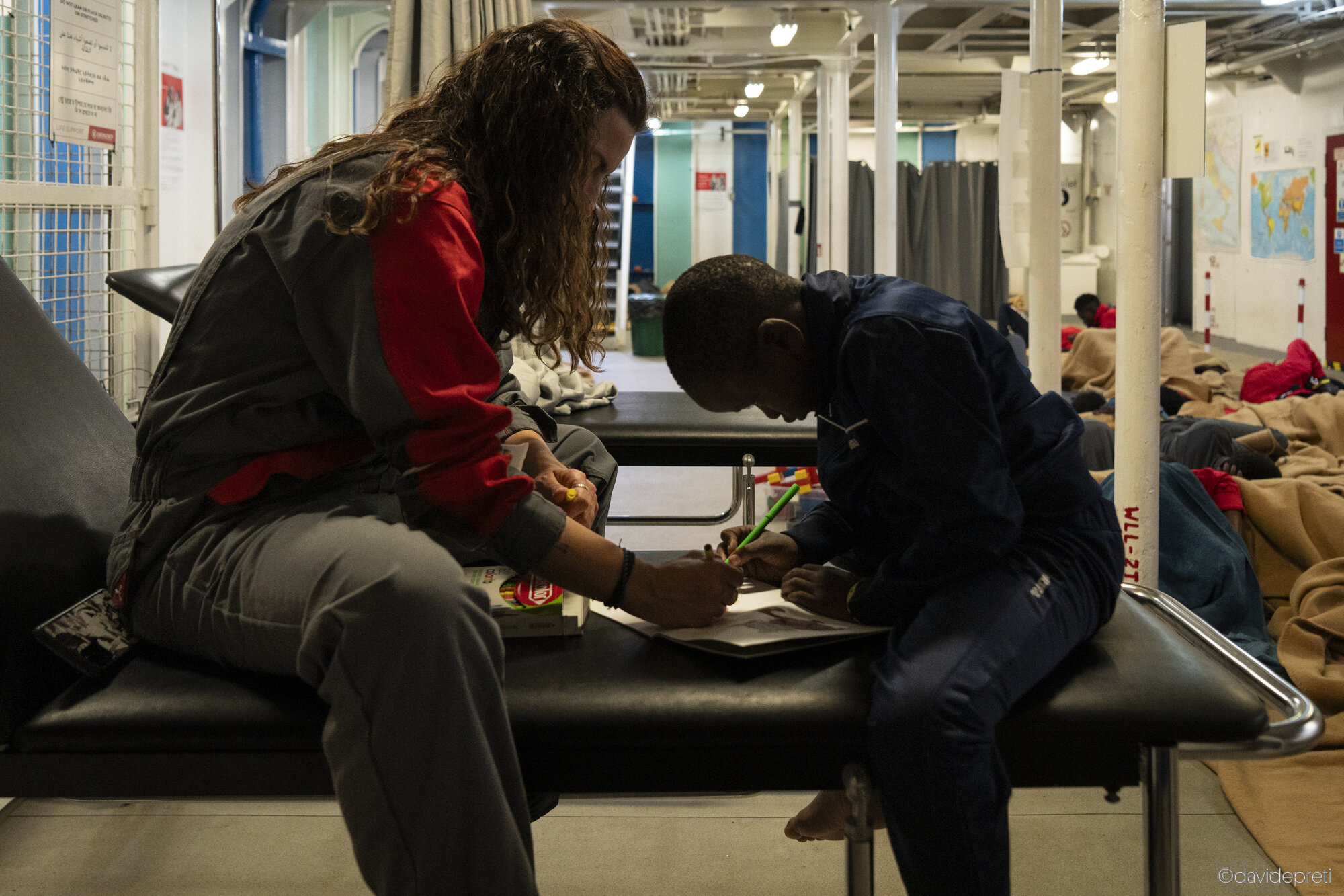 Central Mediterranean Sea — May 4, 2024.

Sara, a nurse aboard the vessel, and M. pass the long hours of the voyage drawing together as they head toward the designated Place of Safety (POS).
