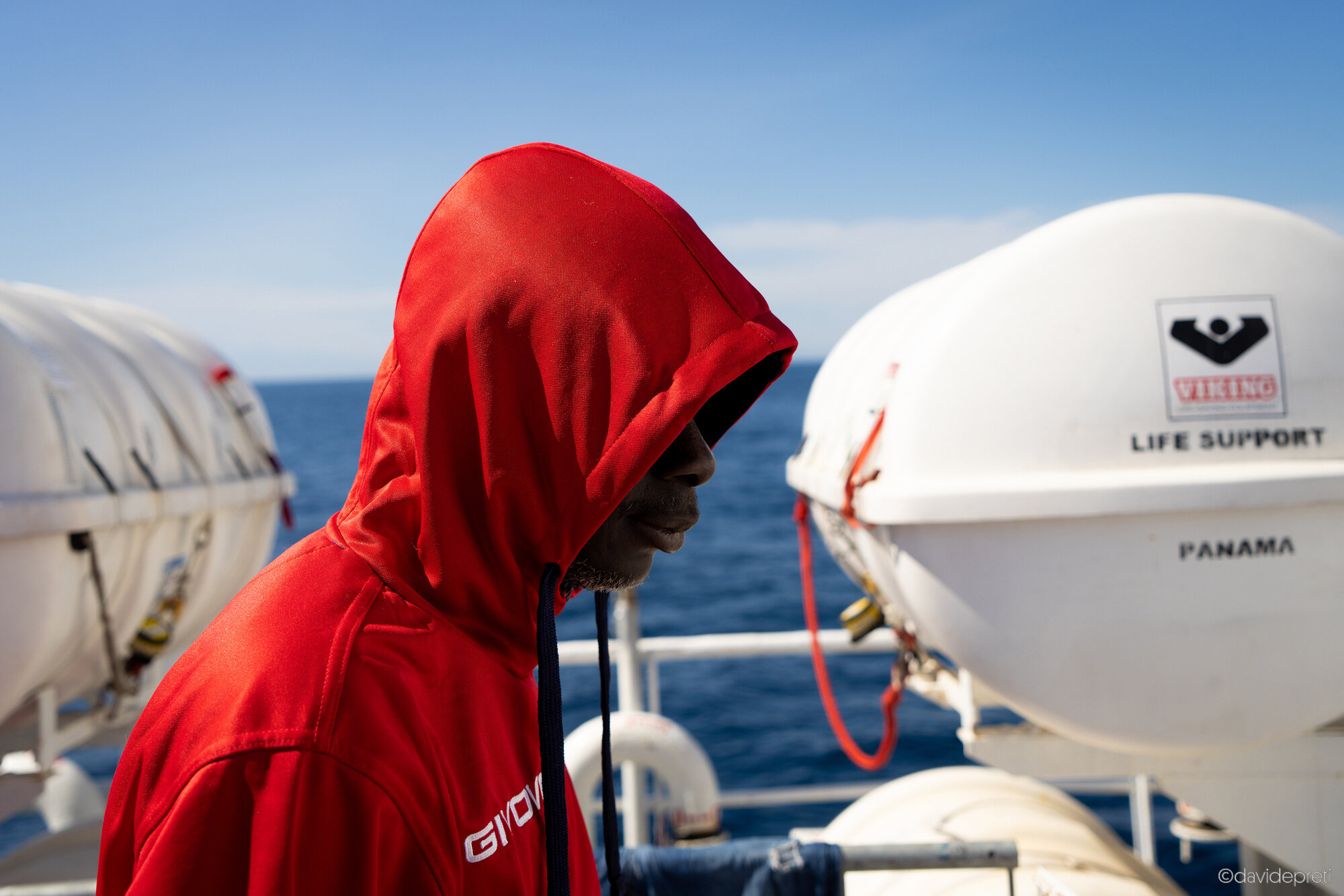 Central Mediterranean Sea — March 26, 2023.

"In 2019 I arrived in Tunisia with my partner. Shortly afterwards little M. was born, now she is one year and three months old," O., 39, from the Ivory Coast, tells me. "I come from the north of my country and if by 30 you are not married with at least three children it is a big problem. My parents started threatening me with 'black magic', they wanted to decide my future wife. So, in 2019 I was forced to leave my country." O. and his future wife A. travelled to Mali, then Niger, Algeria and finally Tunisia. Twenty of them had left but many stopped in Algeria. "We decided to continue to Tunisia, where we got married shortly afterwards. As soon as I became aware of the Ivorian Union in Tunisia, I immediately joined. I was a very active member in the association, I was the delegate in my neighbourhood. We used to map useful services for Ivorians in the area, helping them find work or housing and we use to meet often. I don't remember when, but at some point I started to get stopped on the street by Tunisians. They would ask me if I was a terrorist and if I was planning an attack with the people I was meeting. One evening, on my way home, I was stopped by a group of about 15 people. Firstly they started to provoke me, then to beat me, they broke glass bottles and hit me on the back. I decided to leave immediately with my wife and our little M.. They are now in Genoa and have recently been granted subsidiary protection. I can't wait to hold them in my arms again."
