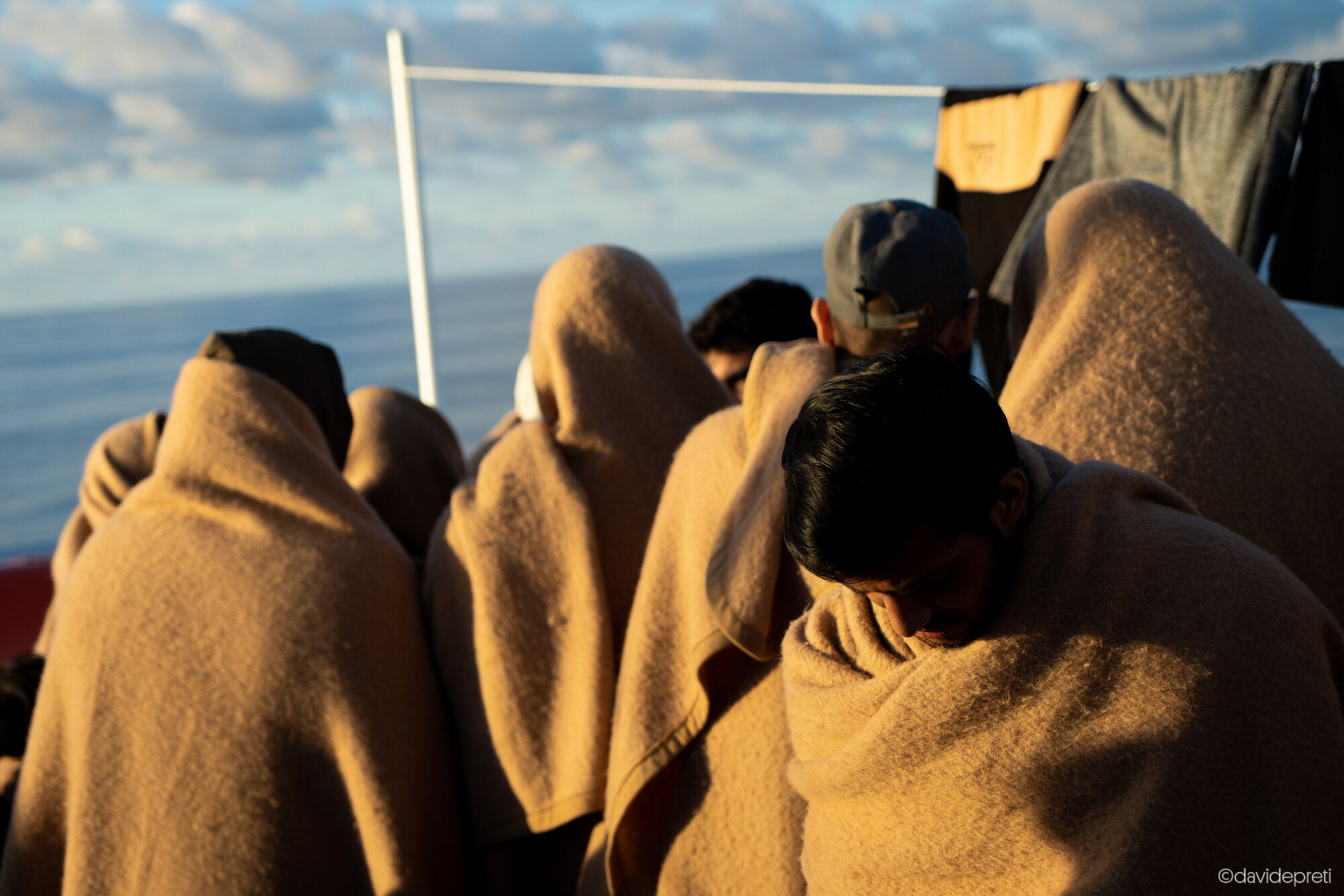 Central Mediterranean Sea — December 20, 2022.

R. is 29 years old and he's Pakistani. He left from Islamabad, made a stopover in Dubai, then Cairo and arrived in Benghazi by flight. In the distressed boat he was lucky because he was sitting on the deck and not in the hold. After about ten hours of journey, tired and a bit drowsy, he slipped into the water. R. cannot swim. Luckily one of his travelling companions managed to throw him an empty petrol can at him that he clung to. That way they were able to get him and bring him back to the boat. R. had to wait more than 20 hours before being rescued.

