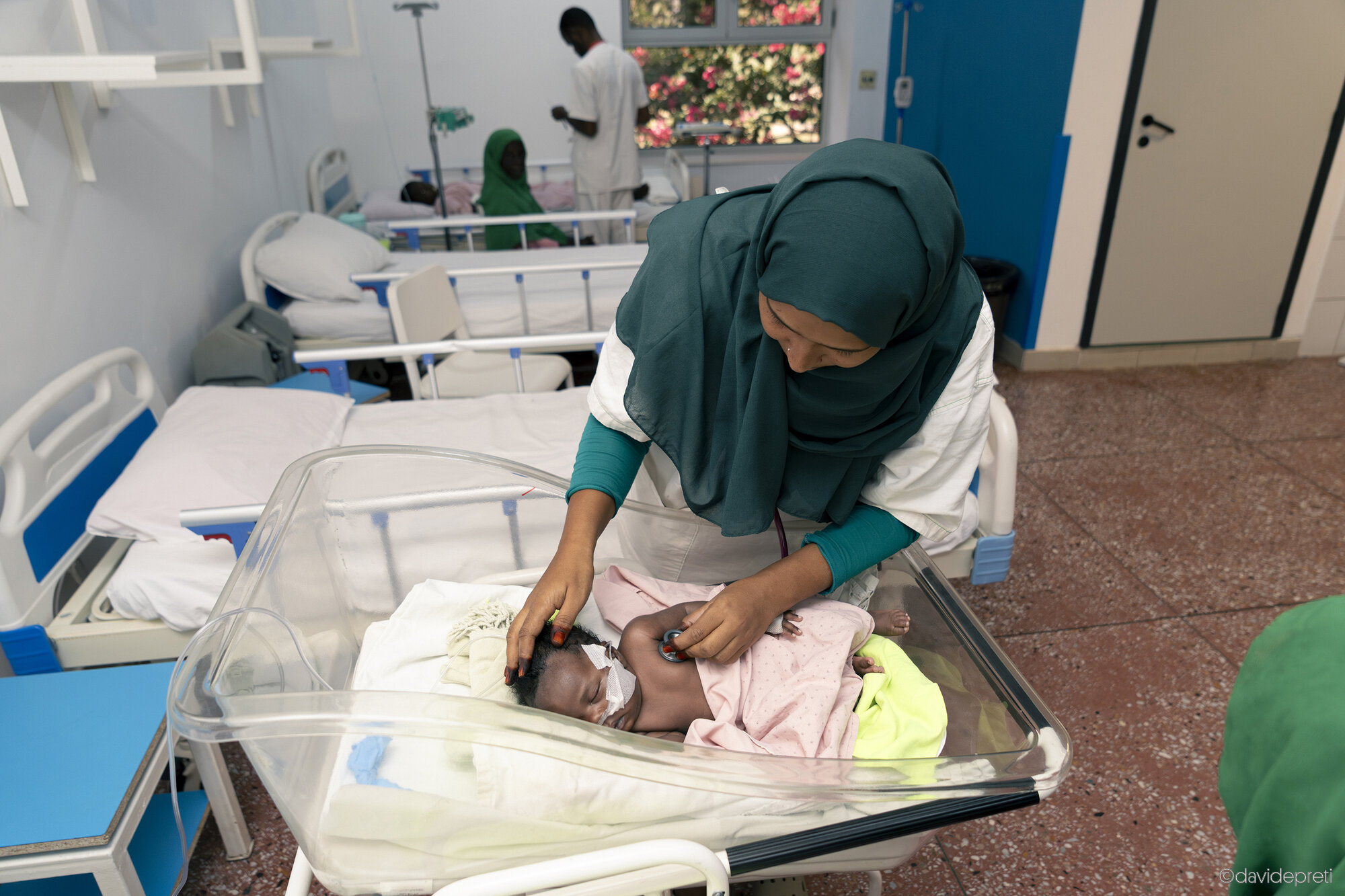 Khartoum, Sudan — November 18, 2025.

A nurse checks the vital signs of an infant in the pediatric ward at EMERGENCY's Salam Centre.
