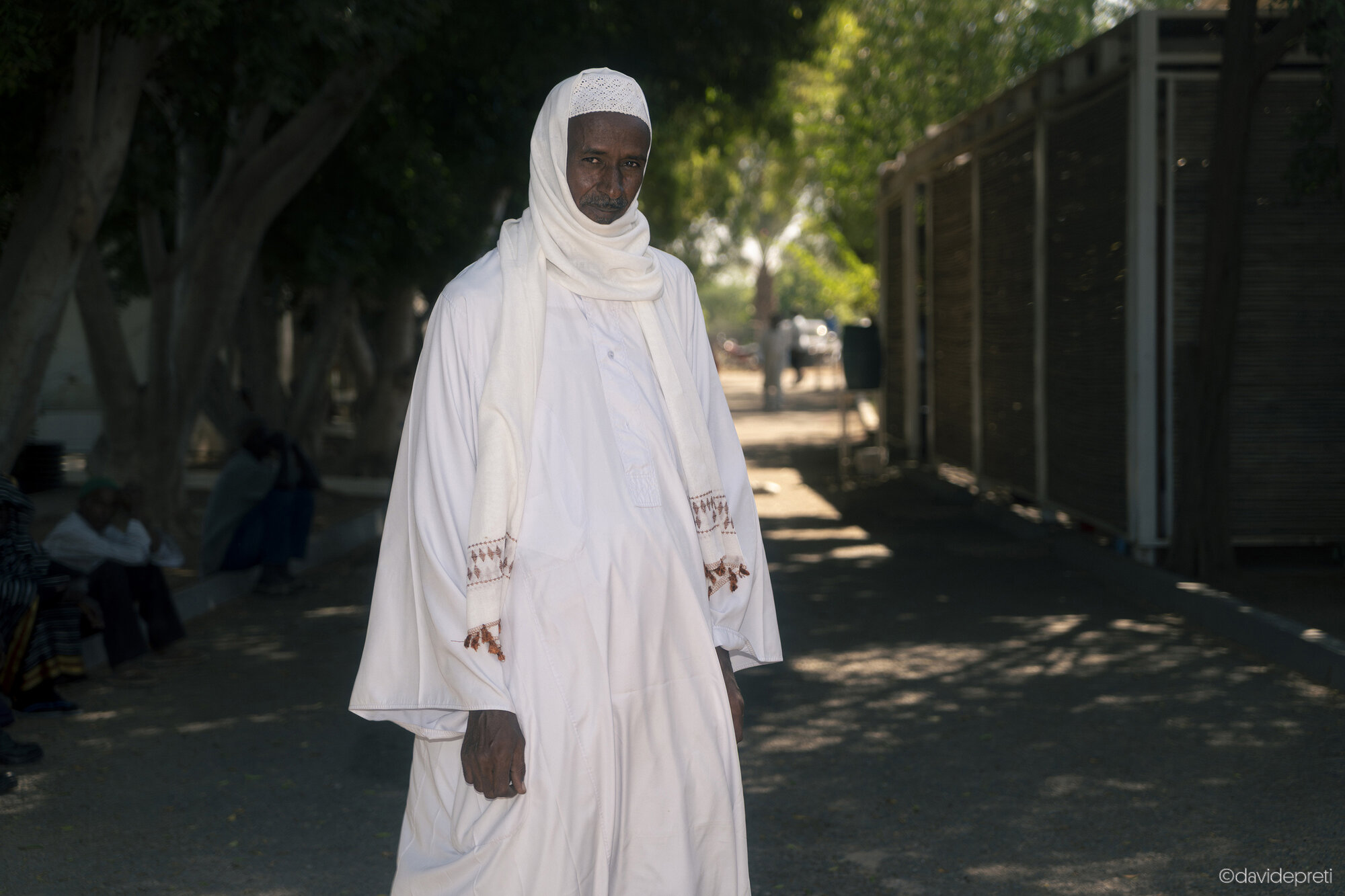 Khartoum, Sudan — November 25, 2025.

D. - 46 yo

He underwent heart surgery at EMERGENCY's Salam Centre in 2019. Before the war, he taught the Quran at one of Omdurman's most prominent mosques. In April 2023, he sought refuge in Gezira. "I thought the fighting would end quickly," he says. "I was wrong." To survive there, he turned to farming. When the RSF occupied the village, the looting began; militiamen killed his uncle for trying to prevent the theft of his truck.

In April 2024, D. accompanied his mother to Kosti for an operation. During those same days, the army launched an offensive to retake Gezira. D. lost all contact with his family. "I didn't know if they were alive," he recalls. After two days of silence, he learned they had survived the fighting. Today, he is back at the Salam Centre for a cardiac check-up.

Despite his damaged mosque and his scattered students, he continues to look forward. "My task will be to find them and bring them back together," he says. "They will be the future doctors and engineers of this country."
