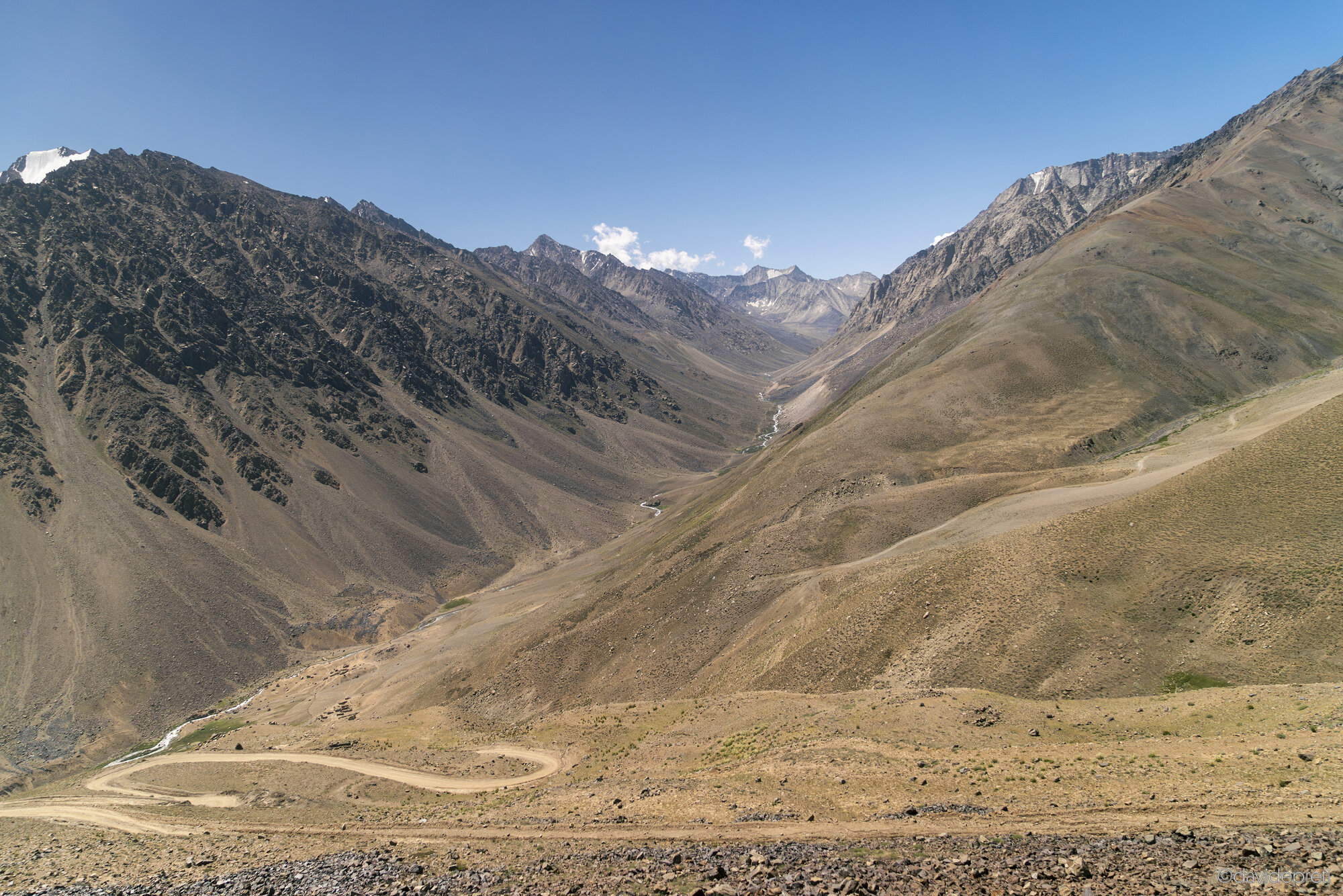 Badakhshan Province, Afghanistan — July 11, 2025.

An aerial view showing the mountain peaks at the western edge of the Pamir range in Badakhshan province.
