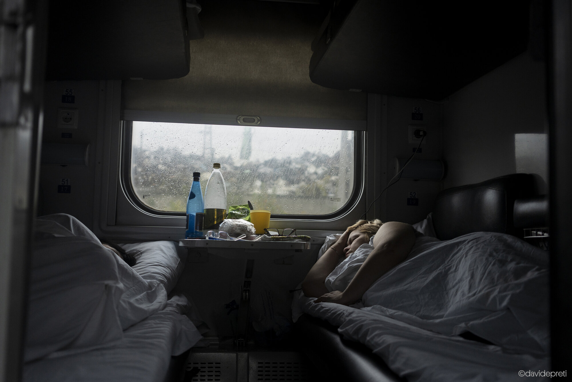 Lviv, Ukraine — October 12, 2024.

Two women resting during the long journey from Przemyśl to Dnipro.
