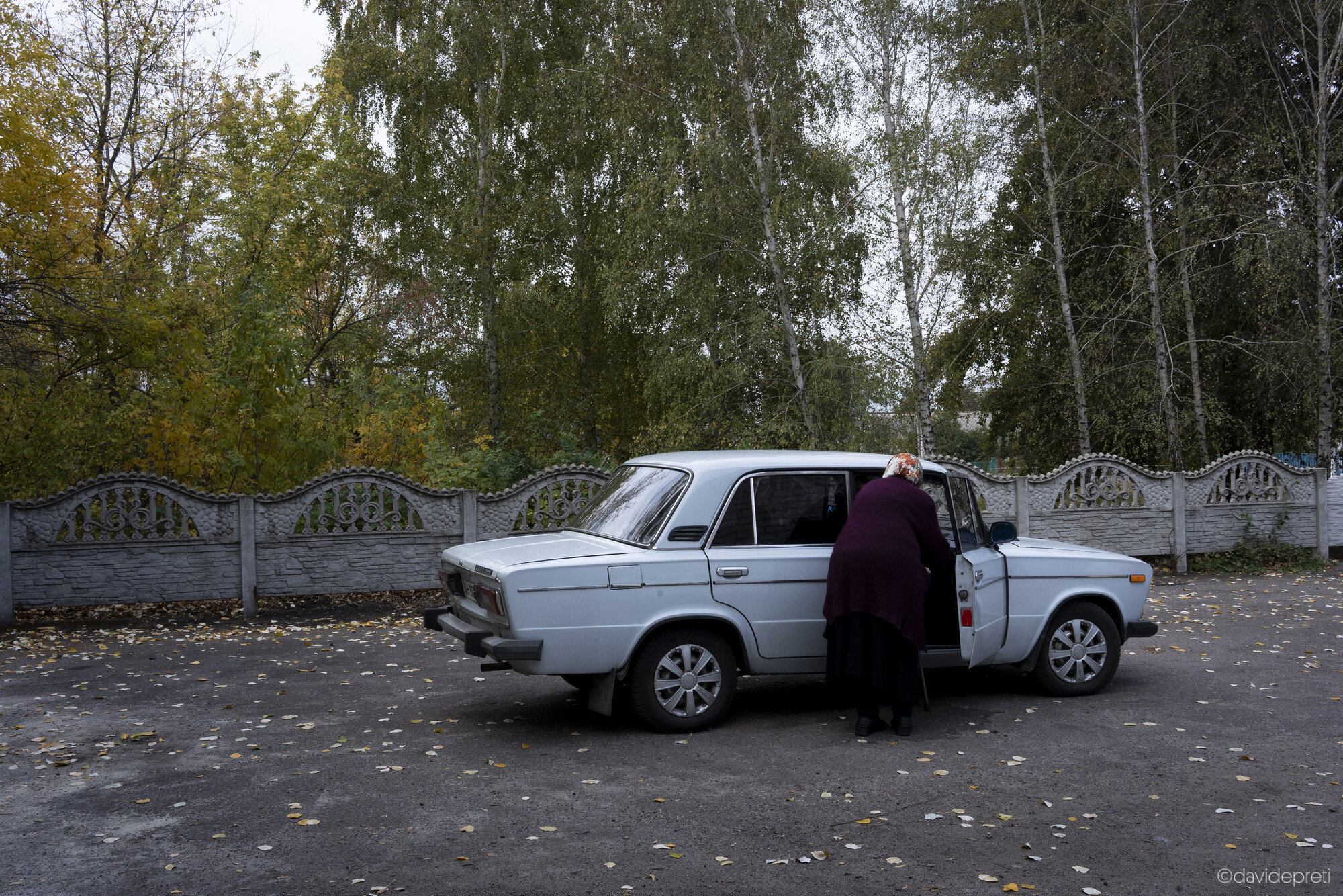 Novopodolvka, Ukraine — October 17, 2024.

An elderly woman returning home following a checkup at the EMERGENCY clinic in Nova Petrovska village.
