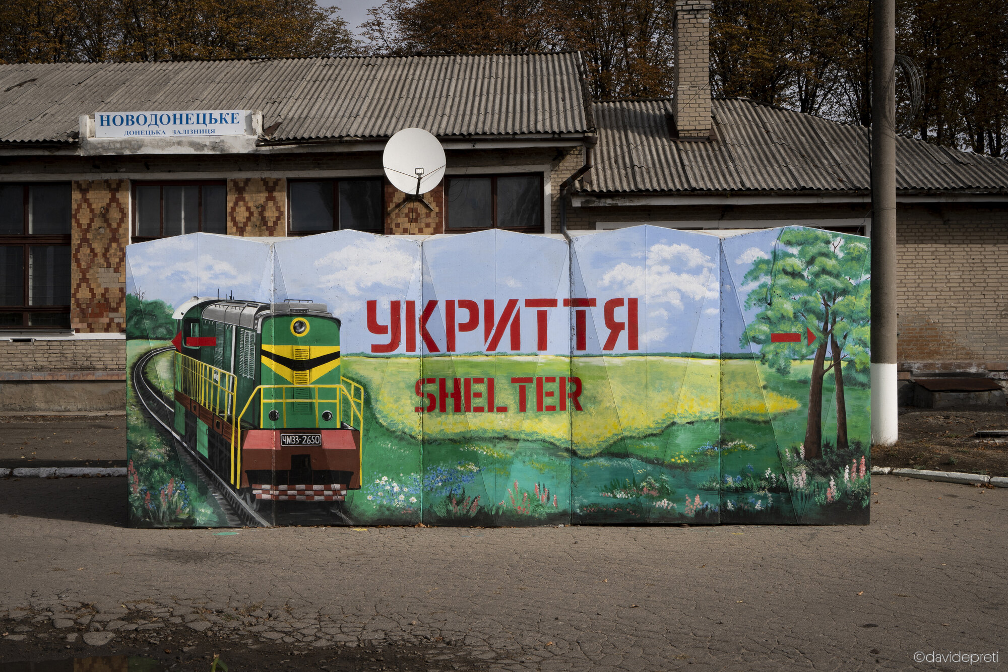 Novodonetske, Ukraine — October 16, 2024.

The entrance to a public air raid shelter located outside the local train station.
